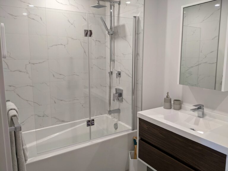 bathtub enclosed by Houston shower doors for a tub