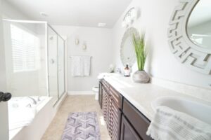 Houston frameless shower door on fiberglass tub surround in modern bathroom